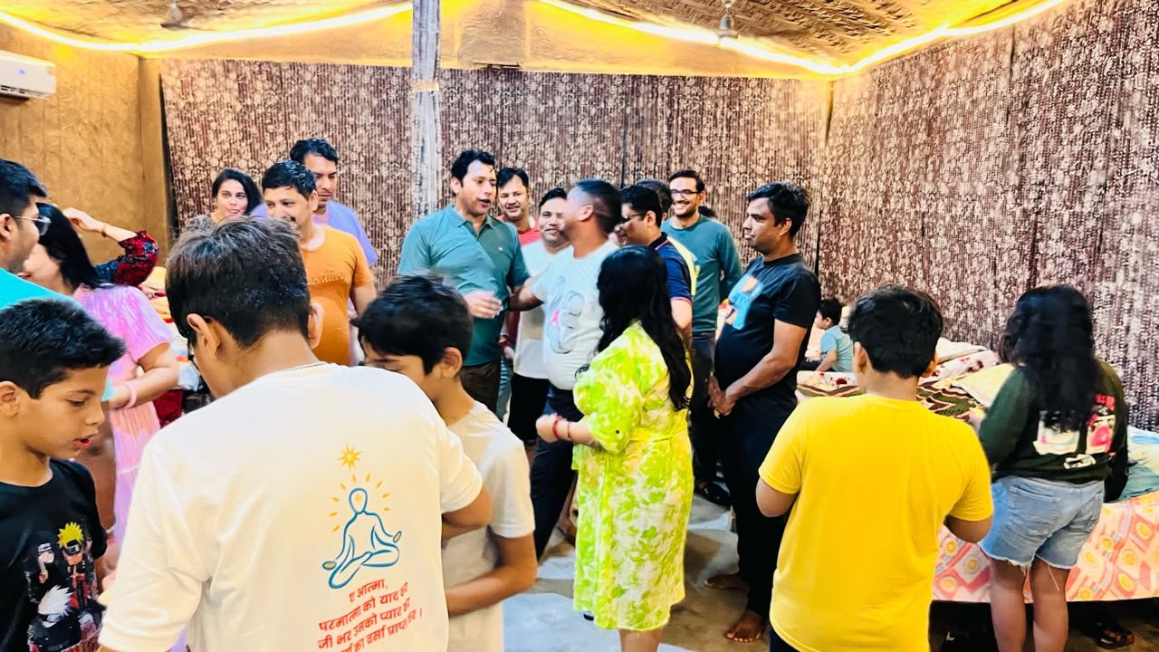 Guests serving themselves at a group meal in the dining area